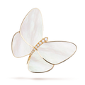 This is a gold, mother-of-pearl, and diamond brooch from Van Cleef & Arpels' Butterfly collection.