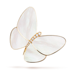 This is a gold, mother-of-pearl, and diamond brooch from Van Cleef & Arpels' Butterfly collection.