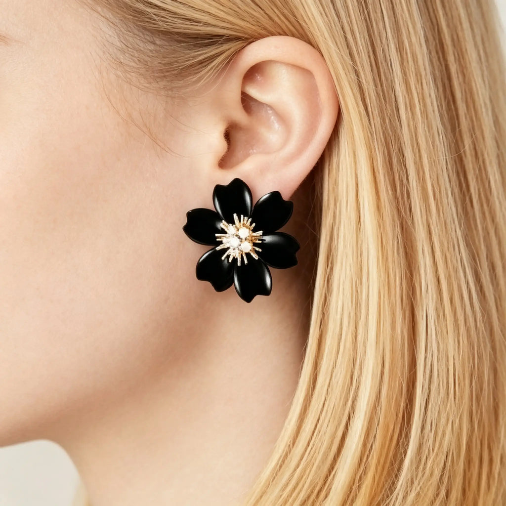 Van Cleef & Arpels Rose de Noël gold earrings