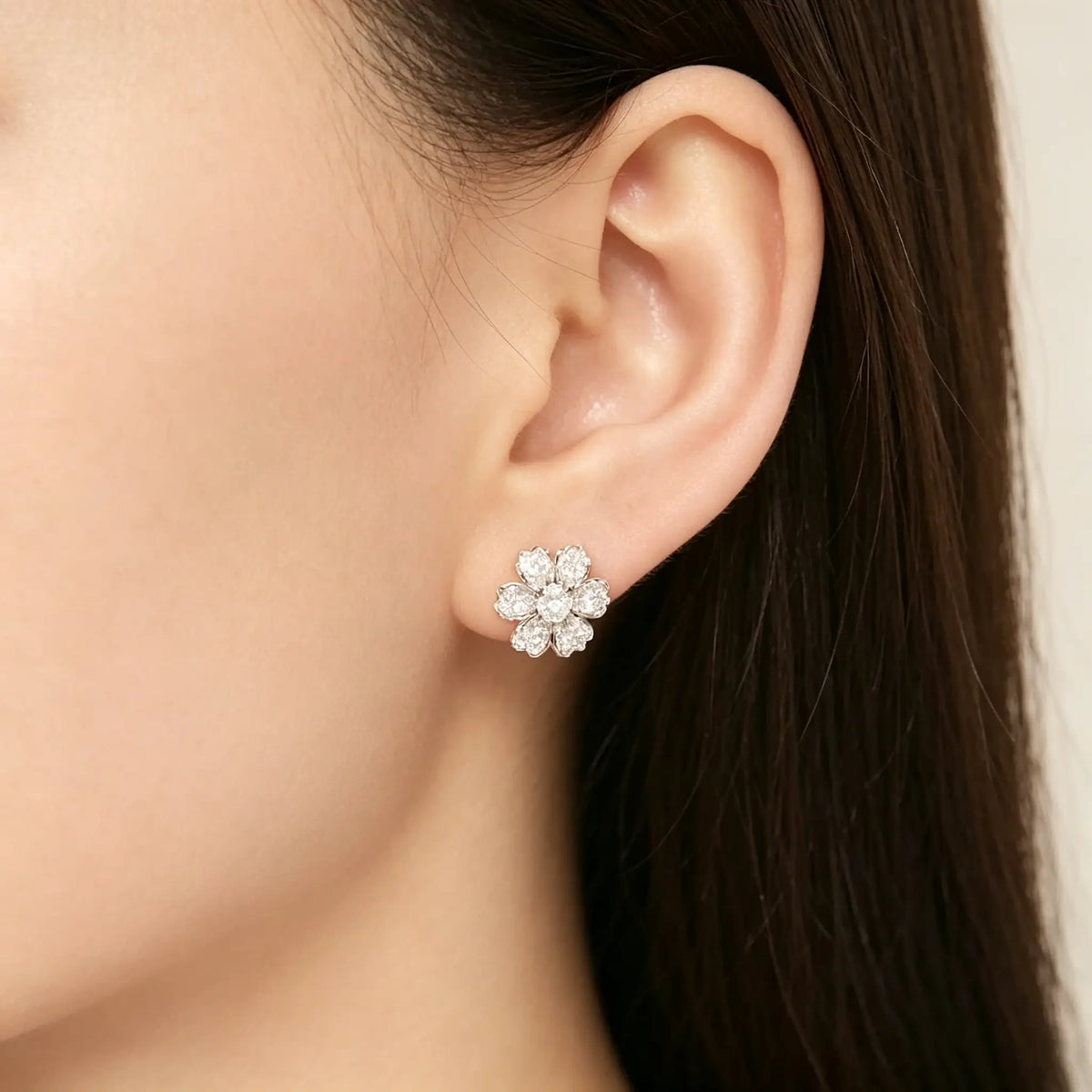Van Cleef & Arpels Fleurette collection rose gold diamond stud earrings