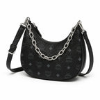 MCM Aren Crescent Bag