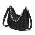 MCM Aren Crescent Bag