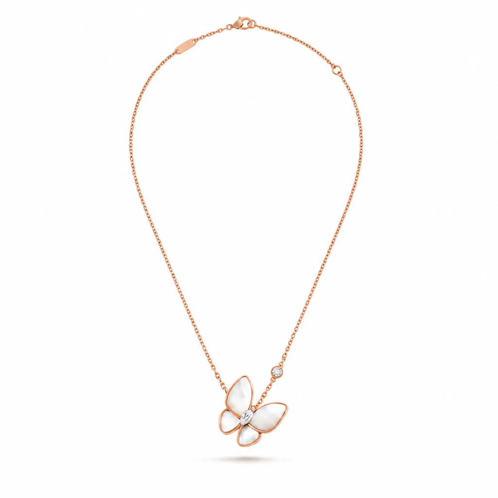 Van Cleef & Arpels Two Butterfly necklace featuring white mother-of-pearl and diamonds.